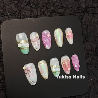 3D Bow & Pearl Opal Nails
